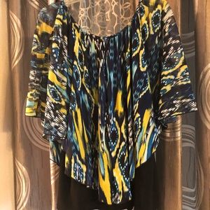 Vibrant flowy summer shirt.